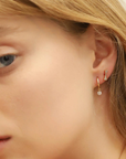 TAI, Dog Bone Stud Earrings