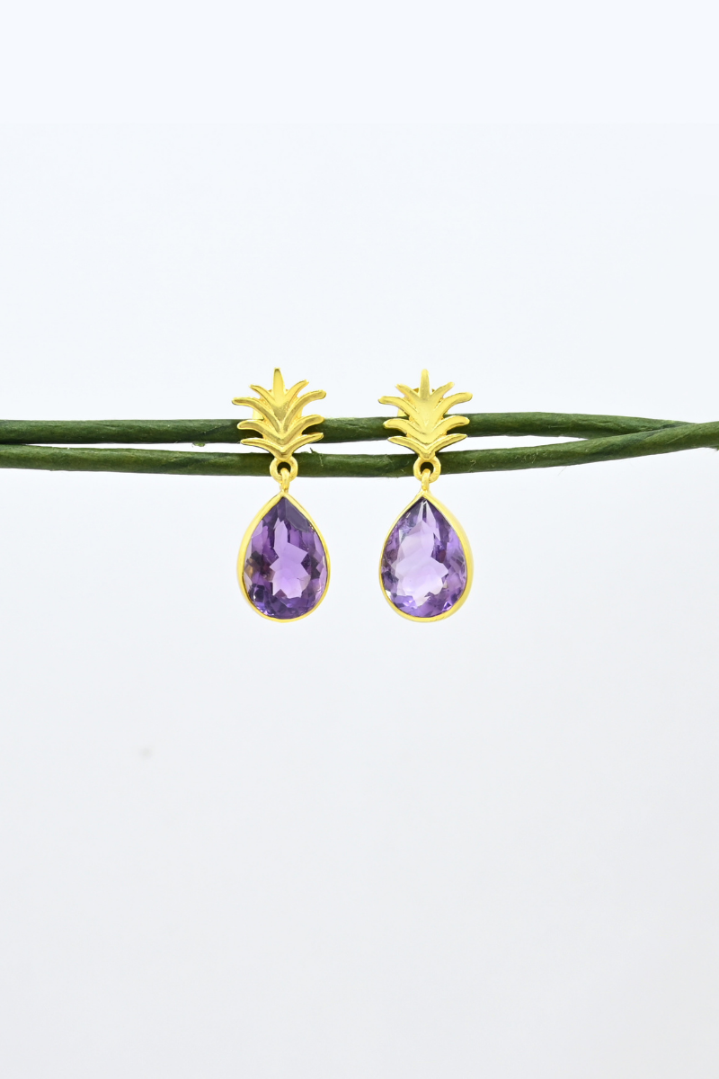 Earrings with 2025 purple stones