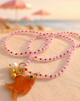 The Makery Collection,  Knotted Pink Necklace- Carved Orange Carnelian Fish Pendant & Friends
